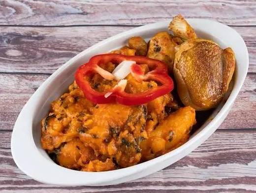Order Yam Porridge food online from Wazobia Kitchen store, Houston on bringmethat.com