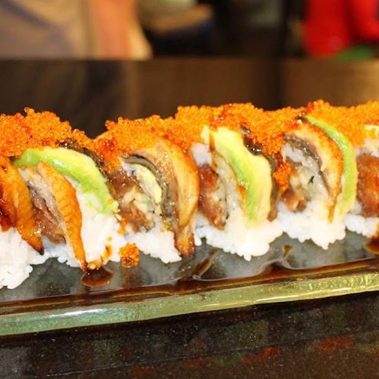 Order Deluxe Cali Roll  food online from Fuji Revolving Sushi Bar store, Cypress on bringmethat.com