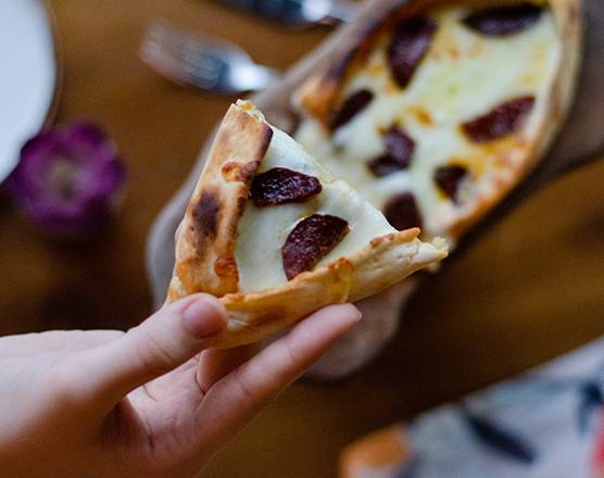 Order SUJUKLU PIDE food online from Agora store, Tysons on bringmethat.com