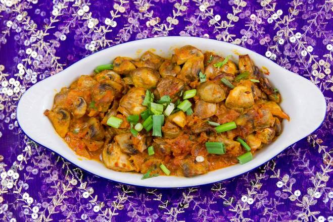 Order Mushroom Masala food online from Nirvana store, New Orleans on bringmethat.com