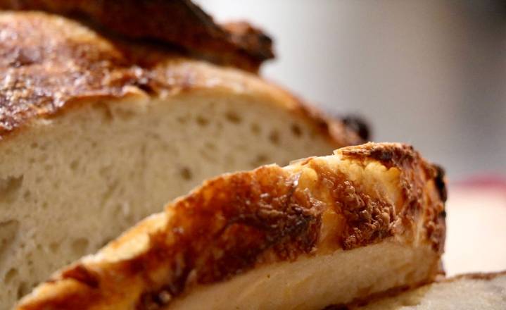 Order Two slices roasted garlic parmesan sourdough (SIDE) food online from Wantz &amp; Kneads store, Los Angeles on bringmethat.com