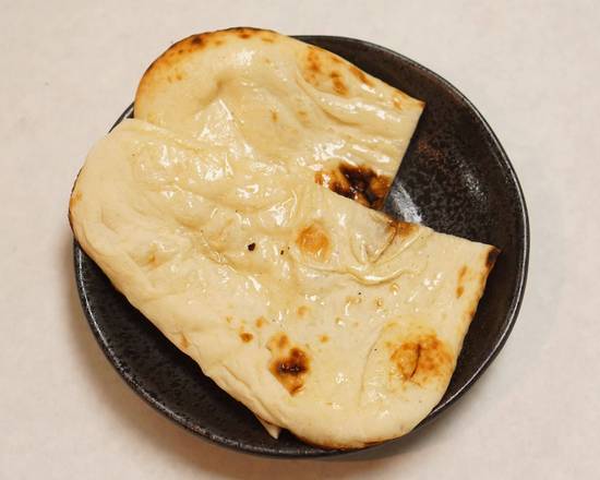 Order Naan food online from Inchin Bamboo Garden store, Nashville on bringmethat.com