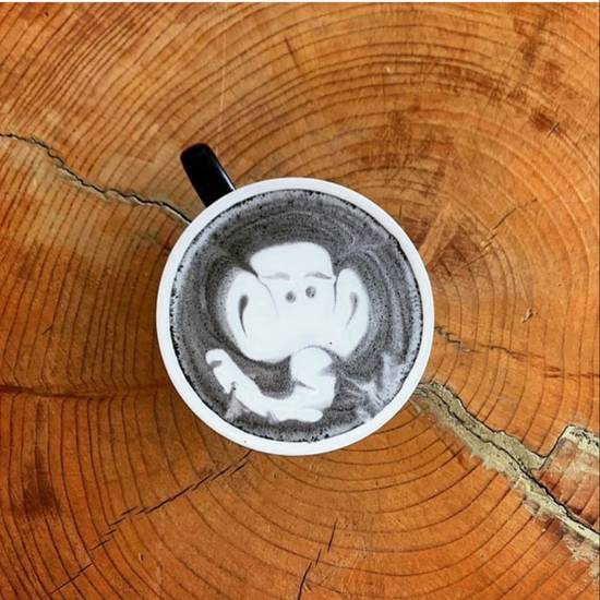 Order Charcoal  Latte food online from Black Elephant Coffee store, Los Angeles on bringmethat.com