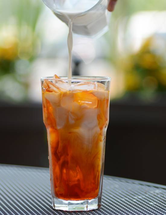 Order Thai Ice Tea with Cream food online from Thai House store, Charlotte on bringmethat.com