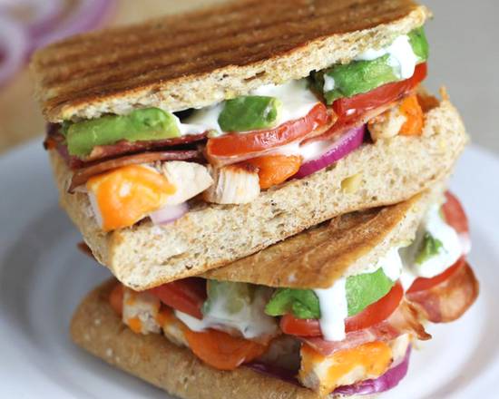 Order Turkey Bacon Avocado Panini food online from Cafe Basil store, Houston on bringmethat.com