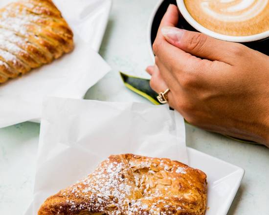 Order Almond Croissant food online from Crema Gourmet Espresso Bar store, Miami on bringmethat.com