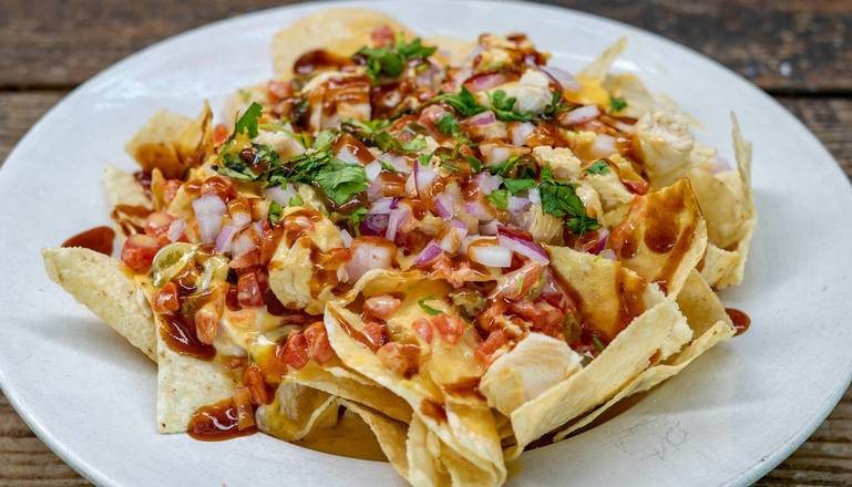 Order Pluckers Nachos food online from Pluckers store, Austin on bringmethat.com