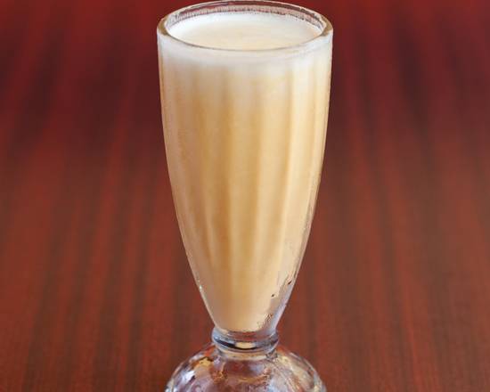 Order Mango Lassi food online from Tandoori India Cuisine store, Santa Ana on bringmethat.com