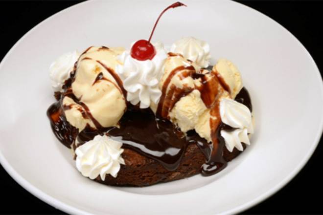 Order GHIRARDELLI® CHOCOLATE BROWNIE SUNDAE food online from Miller Ale House Port St. Lucie store, Port St Lucie on bringmethat.com