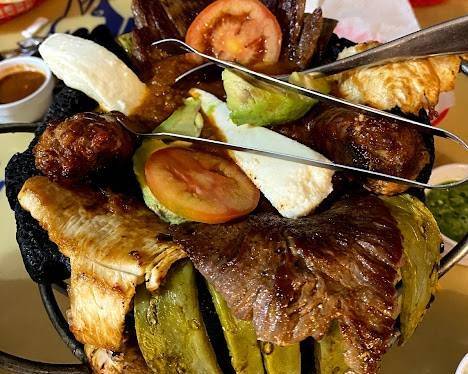 Order Molcajete Ranchero  food online from Millan Ranchito Restaurant store, Huntington Park on bringmethat.com
