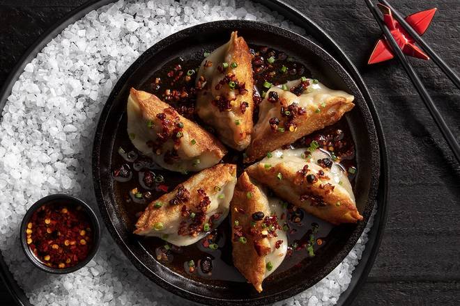 Order Handmade Pork Dumplings | 6 Count food online from P.F. Chang's China Bistro store, Ft. Myers on bringmethat.com