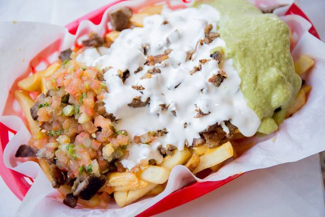 Order Super Nacho Fries food online from La Victoria Taqueria store, San Jose on bringmethat.com