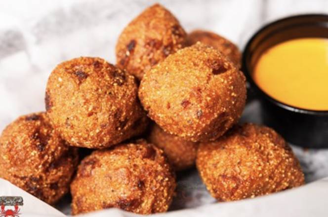 Order Hush Puppies (10 pcs) food online from The Juicy Crab store, Jacksonville on bringmethat.com