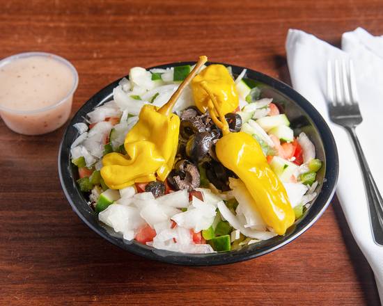 Order Greek Salad food online from Toms Pizza Shop store, DeLand on bringmethat.com