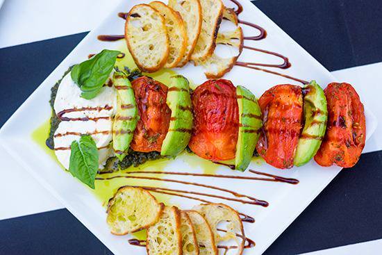 Order Roasted Tomato, Burrata Mozzarella and Avocado food online from Cassis American Brasserie store, Saint Petersburg on bringmethat.com