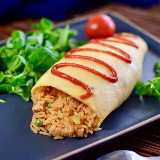 Order M06.Omu Rice food online from Fuji Revolving Sushi Bar store, Cypress on bringmethat.com