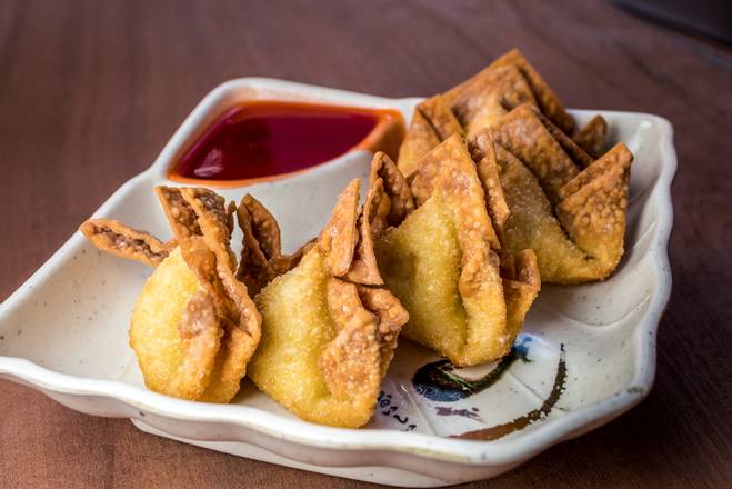 Order Crab Rangoons (5 pcs) food online from Amerasia Kungfood store, Covington on bringmethat.com