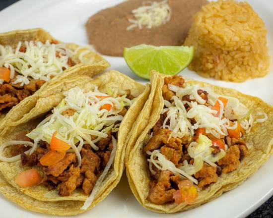 Order Tres Tacos con Arroz y Frijoles food online from Los Fernandez store, Streamwood on bringmethat.com