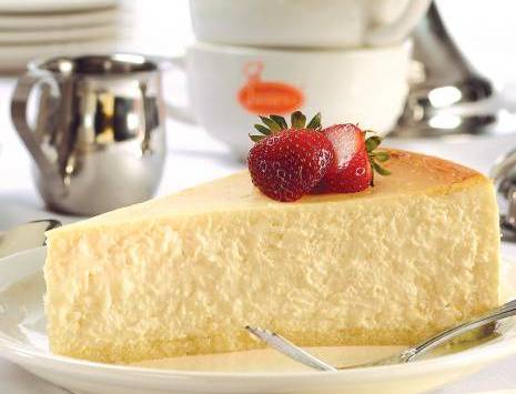 Order Original White Cheesecake food online from Emilios Pizzeria & Restaurante store, Saint Cloud on bringmethat.com