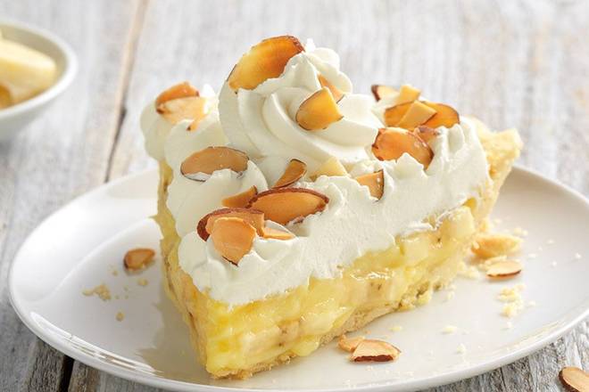 Order Banana Cream Pie Slice food online from Village Inn store, Lakewood on bringmethat.com