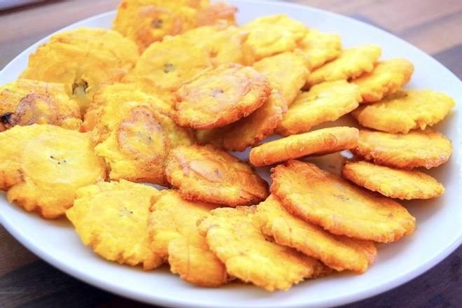 Order Fried Plantains food online from Tom's 2 Kitchen store, Hicksville on bringmethat.com