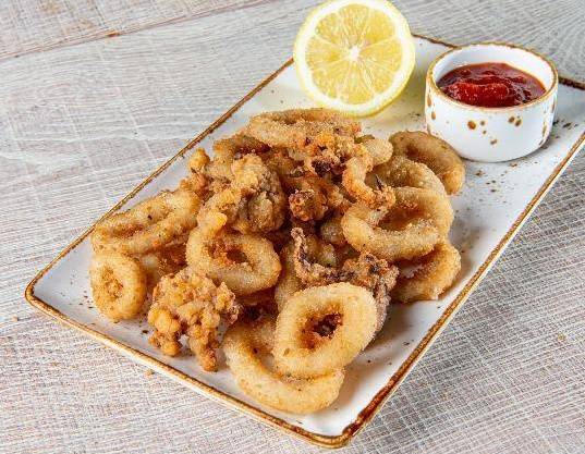 Order Calamari Rings food online from Big Mama & Papa Pizzeria store, Northridge on bringmethat.com