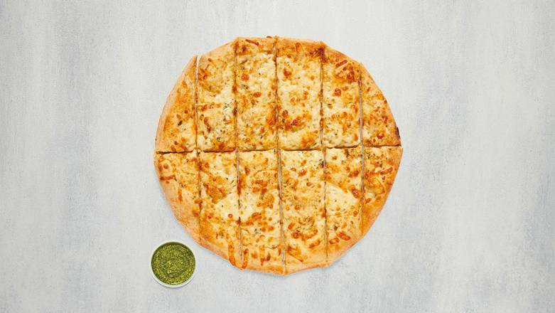 Order Cheesy Garlic Bread - Pesto (3 tbsp) food online from Mod Pizza store, Mukilteo on bringmethat.com
