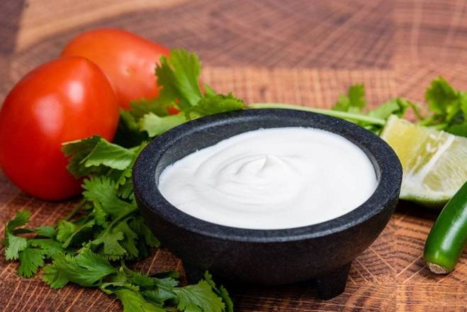 Order Sour Cream food online from La Victoria Taqueria store, San Jose on bringmethat.com