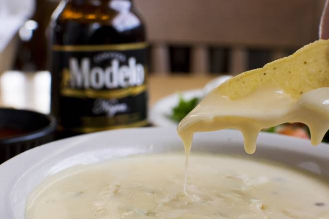 Order White Queso food online from El Chico store, Tulsa on bringmethat.com