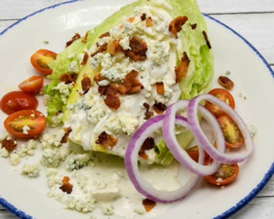 Order Iceberg Wedge Salad food online from Landry's Seafood House store, Orlando on bringmethat.com