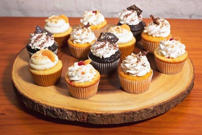 Order Gourmet Cupcakes (1 dz) food online from 2morrows Cakes store, Plant City on bringmethat.com