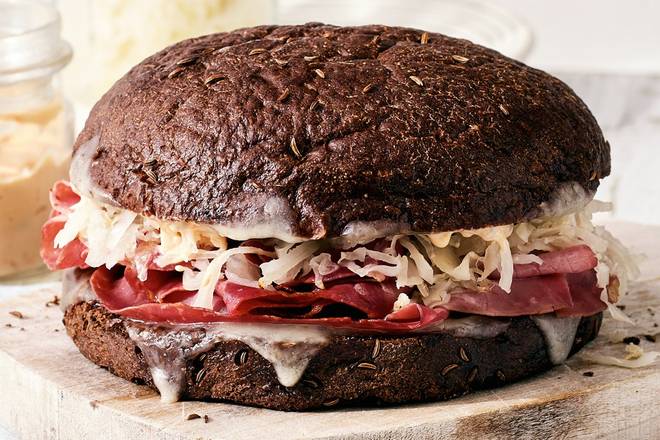 Order Pastrami Reuben Sandwich food online from Schlotzsky's store, Lexington-Fayette on bringmethat.com