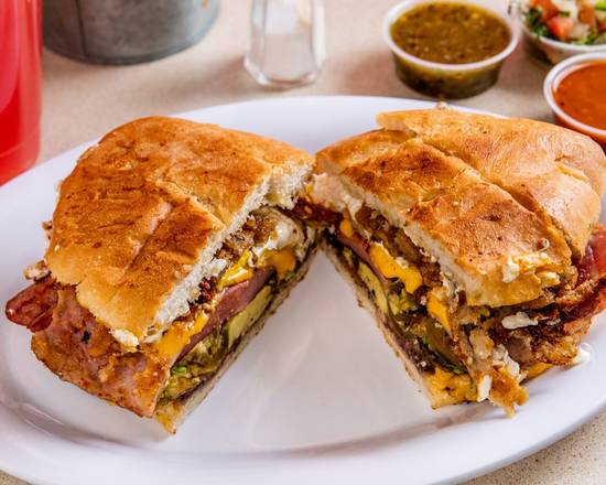 Order Al Pastor Torta food online from Homemade Taqueria store, New York on bringmethat.com