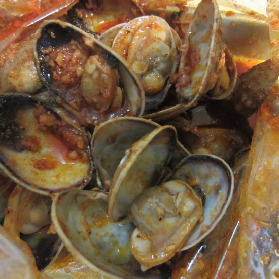 Order 1 Lbs of Clams food online from Kitchen Sooda store, Los Angeles on bringmethat.com