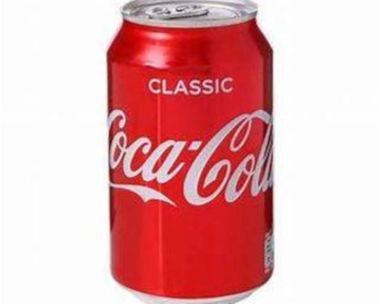 Order 12 oz. Coke (Can) food online from The Royal Breakfast store, Fort Myers on bringmethat.com