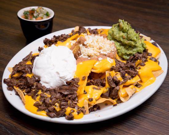 Order Nacho Platter food online from Pepes Mexican Restaurant store, Chicago on bringmethat.com