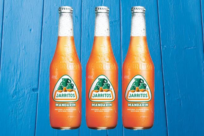 Order Jarritos Bottles food online from Fuzzy's Taco Shop store, Beaumont on bringmethat.com