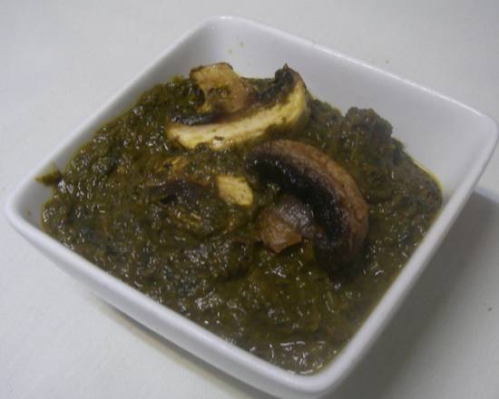 Order Mushroom Palak food online from Masala Dosa store, SF on bringmethat.com