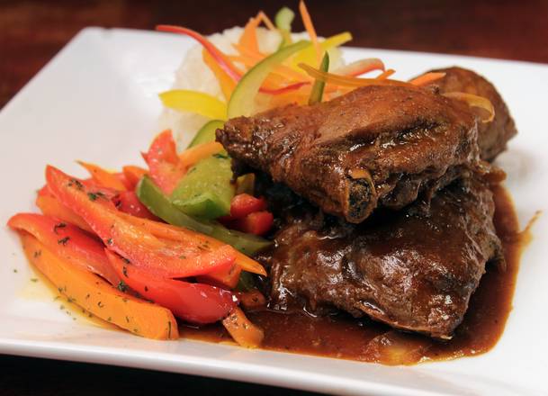 Order Brown Stew Chicken Meal food online from Topaze Restaurant 1 store, New York on bringmethat.com