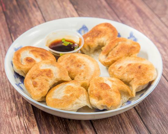 Order Fried Pork Dumpling (8 pcs) food online from Happy Gathering Inc store, Queens on bringmethat.com