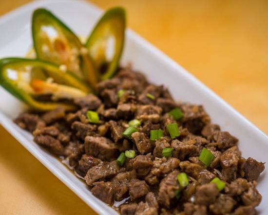 Order Sisig Pork with Rice food online from Kadok Restaurant store, Daly City on bringmethat.com