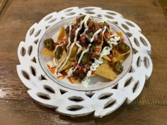 Order Nachos (Meat+Jalapenos+Pico+Sour Cream) food online from El Jefe's Taqueria store, STATE COLLEGE on bringmethat.com