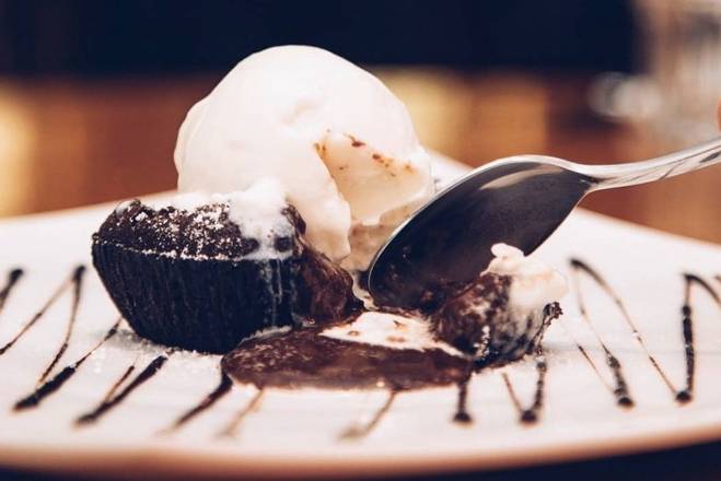 Order Chocolate Lava Cake with Vanilla Gelato food online from Sor Tino store, Los Angeles on bringmethat.com
