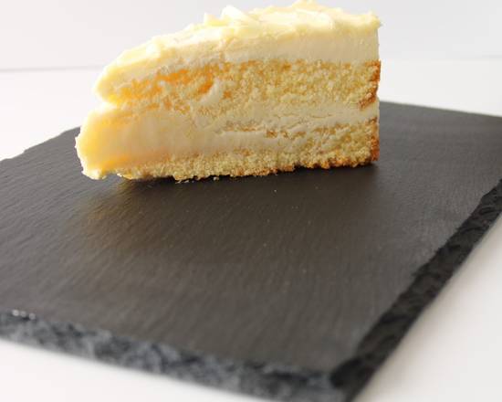 Order Limoncello Cake food online from Espresso Yourself Coffee Shop LLC store, Tampa on bringmethat.com