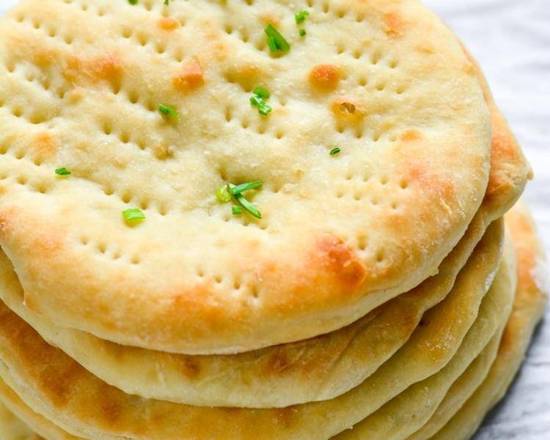 Order Plain Naan Bread food online from Hadi Restaurant store, New York on bringmethat.com