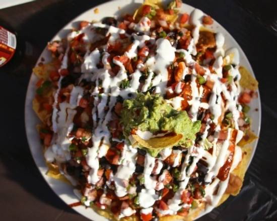 Order Nachos food online from Red Star Taco Bar store, Tacoma on bringmethat.com