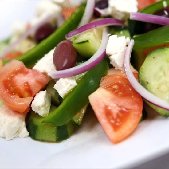 Order Horiatiki Salad food online from Zorba Café store, Washington on bringmethat.com