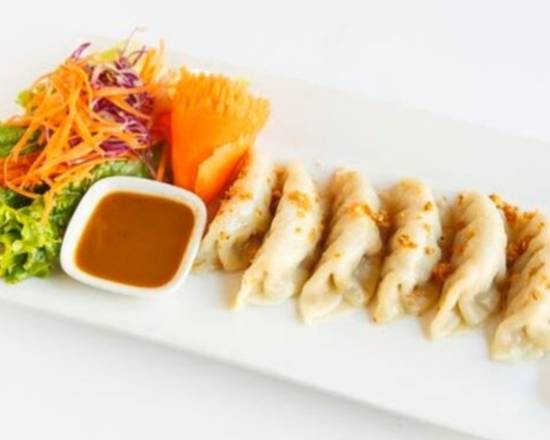 Order Veggie Dumpling=Crispy (6pcs) food online from Emporium Thai Cuisine store, Los Angeles on bringmethat.com