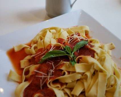 Order Egg Fettuccini with Pomodoro sauce  food online from Francescas Pasta Market & Empanadas store, Aspen on bringmethat.com