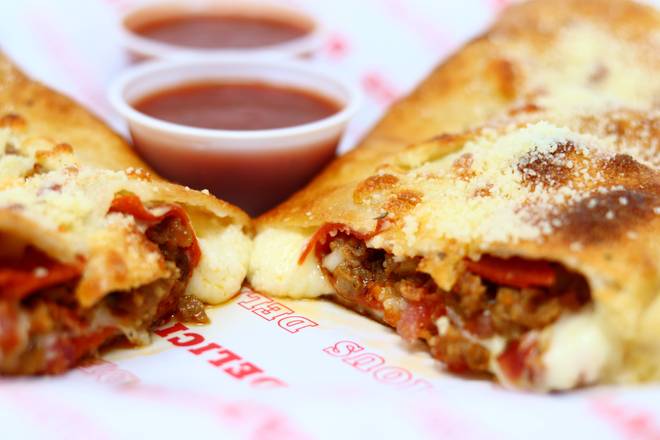 Order Meat Deluxe Calzone food online from King's Pizza store, Daytona Beach on bringmethat.com